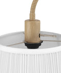 Close-up of socket and adjustable arm on 52 Inch Floor Lamp With Faux Wood Finish And White Pattern Shade Japandi Style Adjustable Arm On Off Rotary Switch Socket For Easy Operation Ideal Modern Living Room Light.