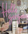 Neon Sign Wall Art Light for Bedroom Bar Pub Club Rave Decor 60x37cm, LED neon sign 'Hello Gorgeous' in a modern interior setting.