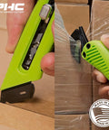 Heavy Duty Box Cutter Utility Knife With Tape Splitter And Film Cutter in use on cardboard box and plastic film wrap close-up