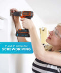 Black+Decker cordless drill/driver with 20V battery and 109-piece bit set (orange/black).
