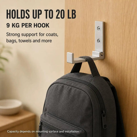 Legit Heavy Duty Folding Wall Hooks 4 Pack Silver Aluminum Alloy Flip Down Coat Rack holding a backpack on wood door.