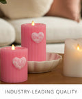Flickering Flameless Pillar Candle 3.7x4.5 Inches With Real Flame Effect Pink Ribbed Wax Embossed Heart LED Light shown on table