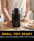 Elite Gourmet ECG914 Electric Coffee And Spice Grinder Heavy Duty Stainless Steel Blade One Touch Operation Black compact design in kitchen.