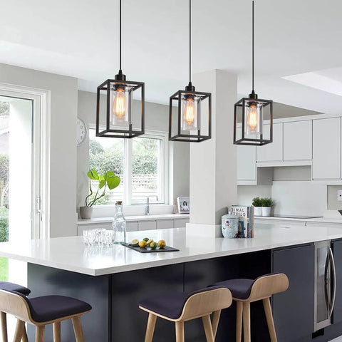 Rock Solid Black Pendant Lights For Kitchen Island, 3 Pack Sleek Industrial Farmhouse Lanterns With Adjustable Height And Clear Glass Shade above a modern kitchen island