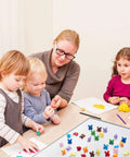 Kids engaging with Super Cool Rainbow Counting Bears Set With Nine Rad Colors Perfect For Toddler Math Manipulatives And Preschool Activities.