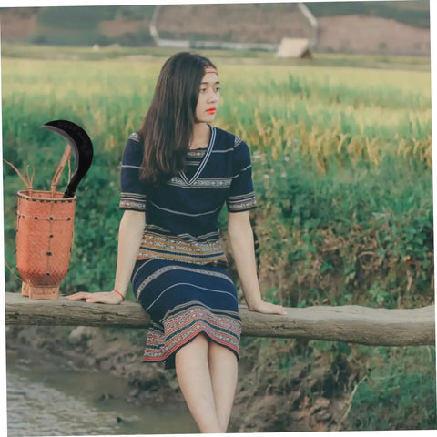 Manganese Steel Long Handle Scythe For Weeding And Lawn Care with basket in rural setting, landscape background