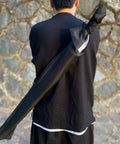 Person holding 41 Inch Polypropylene Katana Sword For Training With Black Scabbard High Toughness Practice Blade