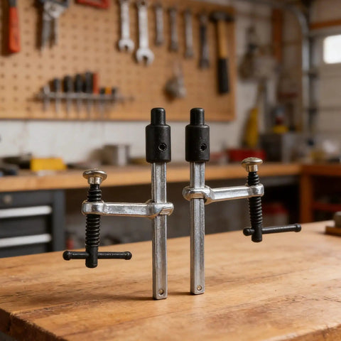 Two Pack Quick Action Bench Dog Clamps For 16mm Holes Hold Down Clips with Fast Lock in workshop setting.