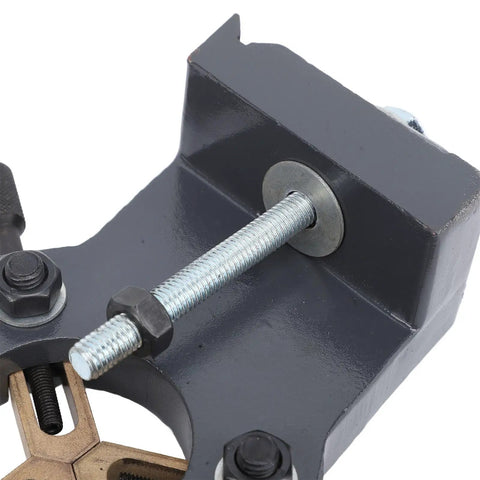 Close-up of a grey metal stabilizer component from a beefy wood lathe steady rest for mini turning projects, showing hardware details.