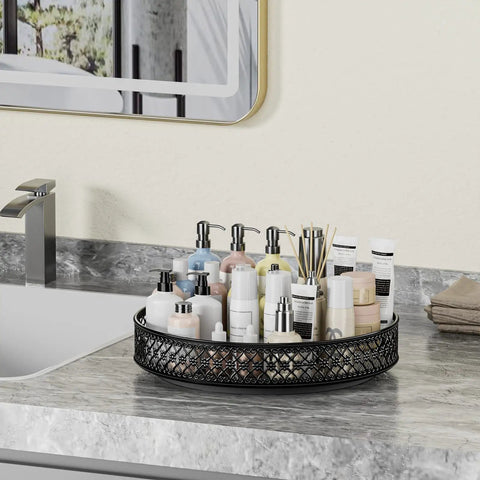 13 Inch Lazy Susan Turntable Heavy Duty Metal Spice Rack Organizer Built Tough As A Rock With A Smooth 360 Swivel Base Rust Resistant Finish For Kitchen Storage with beauty products on a bathroom counter.