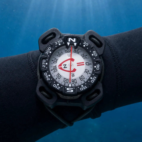 Bungee Mount Scuba Dive Compass With Glow In The Dark Face shown underwater with PVC housing for diving visibility