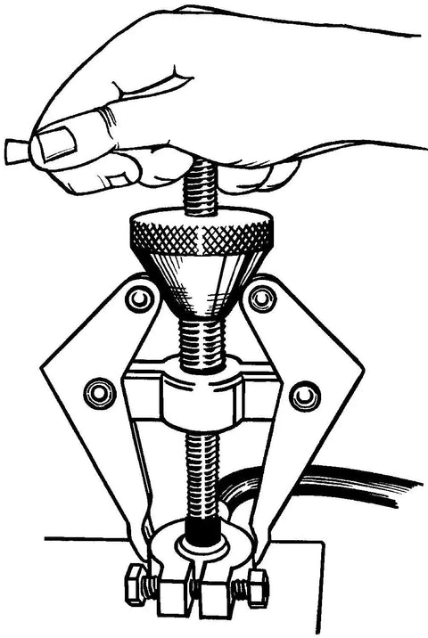 Illustration of Dual Purpose Battery Terminal And Wiper Arm Puller For Easy Removal Of Stuck Terminals And Bolted On Wiper Arms Center Screw Lifts Clamp Off Terminal And Fits Over Tapered Spline For Automotive Repair And Maintenance From Lisle being used to lift a terminal.