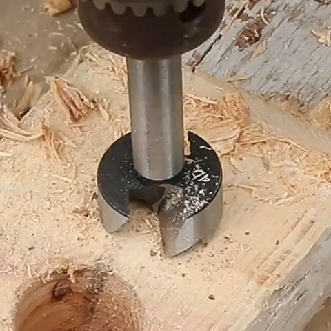 8 Piece Forstner Bit Set Kickass Heat Treated Carbon Steel Drill Bits For Wood 1/4 To 1 3/8 Inch drilling into wood surface