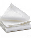 Shade Cloth Ninety Percent White 8 By 10 Foot HDPE Sun Shade Sail, folded with grommets visible, for patio garden greenhouse use