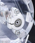 Close-up of the Bedini Motor Science Toy Kit with brushless disc motor and magnets for 24V STEM projects, polished metal component.
