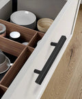 Open kitchen drawer with 30 Piece 3 Inch Black Cabinet Pulls Square Stainless Steel Handles With Screws For Kitchen Cabinets, Flat Black Finish PHJ22BK76 mounted on the side.