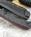Fixed Blade Knife With D2 Steel Blade, Textured G10 Handle, And Kydex Sheath For Safe Carry; close-up of the handle and sheath