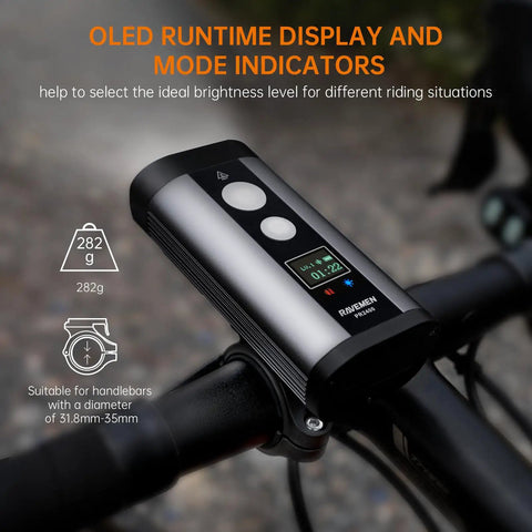 PR2400 2400 Lumen Mountain Bike Light With OLED Runtime Display mounted on handlebars.