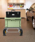 Heavy Duty All Terrain Moving Dolly With Six 10 Inch Inflatable Wheels For Up To 1200 Lbs Load Beefy Carbon Steel Frame Pro Grade Moving Cart For Appliances And Heavy Equipment in garage with storage crates