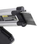 Close-up of Built Tough Air Powered 18 Gauge L Cleat Flooring Nailer showing cleats feeding mechanism and safety warning.