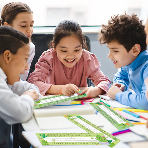Children using 48 Pcs Cactus Name Tags Set With Four Fun Designs For Classroom Desk Labels and Decor in a classroom.