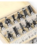 Top Notch 12-Piece 1/2 Inch Shank Wood Milling Cutter Set For Serious Router Grindings arranged in a wooden case with black bits.