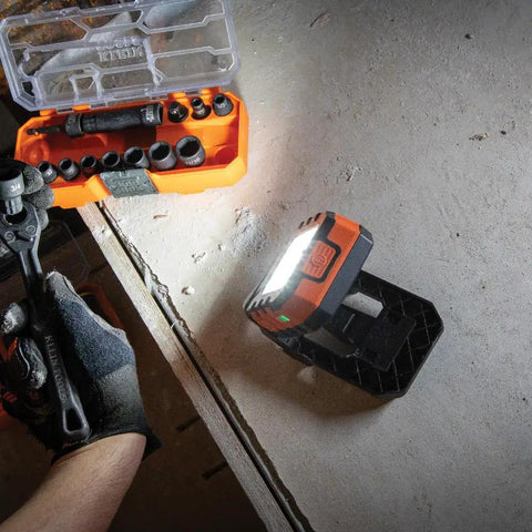 Rechargeable LED Work Light With 1000 Lumens, Magnetic Mount, 360 Degree Rotation, Kickstand, Three Lighting Modes For All Day Runtime in use on jobsite floor