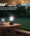 Hand Crank Solar Camping Lantern With 3000mAh Battery, Ultra Bright LED Torch on picnic table outdoors at night