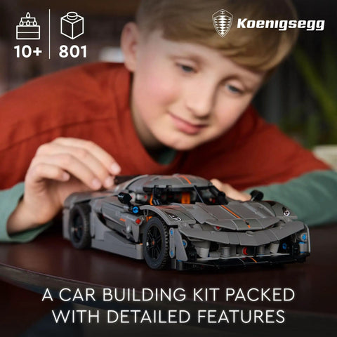 Child playing with Koenigsegg Jesko Absolut Grey Hypercar Buildable Model Kit For Kids And Teens Realistic Sport Car Toy