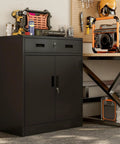 Beefy Heavy Duty Metal Storage Cabinet With One Drawer And Adjustable Shelf For Garage Office Or Home Locking Short Cabinet In Black Built To Last For Tools And Gear 36 Inch H By 27.5 Inch W By 16 Inch D in garage setting.