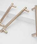 Champagne Bronze Knurled Cabinet Handles Set, 30 Pack, 6-1/4 Inch (160mm) Gold Knurled Pulls on white surface