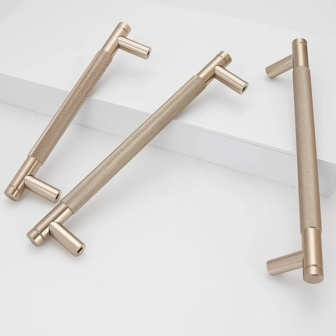 Champagne Bronze Knurled Cabinet Handles Set, 30 Pack, 6-1/4 Inch (160mm) Gold Knurled Pulls on white surface