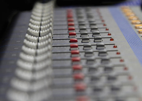 Close-up of 12 Channel Mixer With USB And SPX Digital Effects, Studio Grade D Pre Preamps Deliver Fat Bass, buttons and sliders view