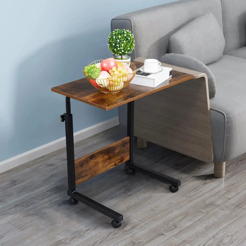 Rock Solid Height Adjustable Computer Desk With Smooth Rollin Casters For Easy Repositioning And Firm Lockdown Heavy Duty Steel Top crafted as a compact workspace beside a sofa.
