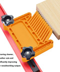 Heavy Duty Stackable Featherboard Woodshop Safety Kickback Blocker Table Saw Router Table Band Saw Dead Grip Clamping Accessory on red rail with wood piece.