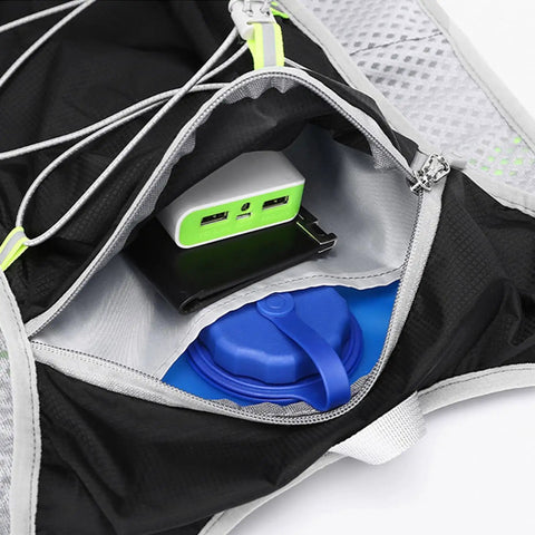 Interior view of waterproof hydration backpack showing water bladder and pockets for hiking and outdoor adventures.
