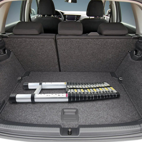 15.5 Foot Telescoping Ladder Made From Aluminum Extendable Multi Purpose Folding Ladder shown folded in car trunk