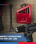 Angled side view of cordless drill with 10-piece screw-extractor and left-hand drill-bit set; red bit case on pegboard.