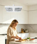 Socket Ceiling Fan, E27 Screw Base with Remote, Small Ceiling Fan with Light above a woman cooking in a modern kitchen.