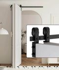 Installed 52 Inch Bi Folding Barn Door Hardware Kit For Two Doors With Low Ceiling Lite Roller System on white interior door