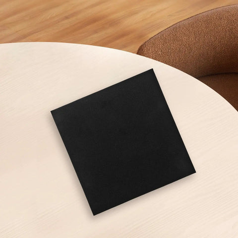 High Density Foam Inserts For Packaging And Tool Boxes That Stand Up To Deformation, black square foam on light wood table