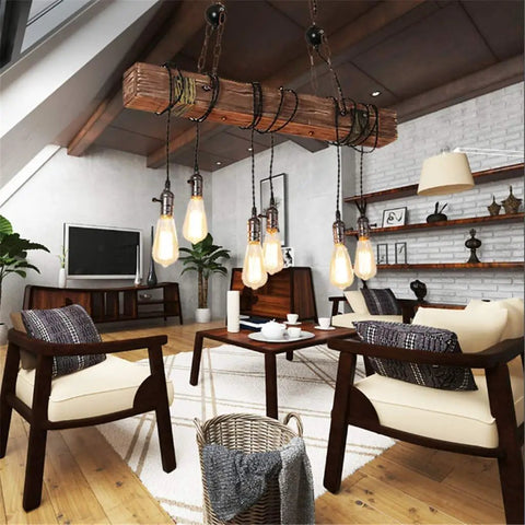 Rustic Farmhouse Chandelier For Dining Room Industrial Pendant Light With Six E26 Bulb Sockets hanging in a cozy living room