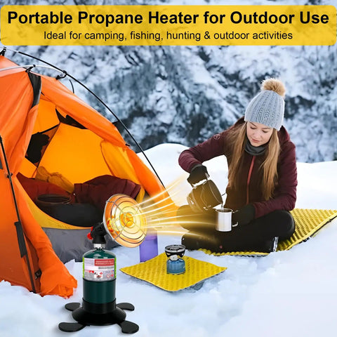 Portable Propane Heater For Outdoors next to an orange tent, in use for camping on snow with a person preparing a drink.