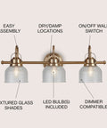 Brass Gold Sleek 25.25-Inch Modern Bathroom Vanity Light 3-Light LED Wall Sconce With Clear Glass Bell Shades For Mirror Hallway Kitchen ETL Listed LED Bulbs Included Lit; three glass shades, dimmer compatible, wall switch.