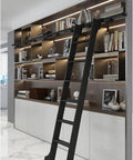 Black Slick Sliding Ladder Door Hardware Kit With Retractable Rolling Ladder Full Track System installed in a modern home library