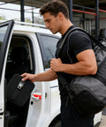 Man using Set Of Four Silicone Auto Door Dampers Knock Out Heavy Slam Noise And Vibes With Grippy Hold For Trucks Suvs Vans And Rv Vehicles To Deliver A Totally Slick Quiet Close Every Drive in a vehicle.