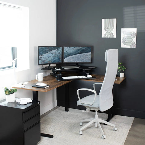 Home office with 43 Inch Corner Height Adjustable Desk Converter For Sit To Stand Workstation With Dual Monitor Riser, Black Tabletop Stand Up Desk, V Series For Home Office Use.