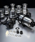 E Bike Hub Motor Axle Kit With 12mm Shaft Front Lock Nut Washer And Protective Cover, components assembled on a table.
