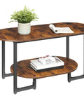 Oval Wood Coffee Table With Dual Open Storage Shelves Chill Farmhouse Vibe For Cozy Living Rooms And Home Offices Rustic Brown Finish with plant and magazines.