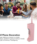 Kickass Vintage Cellphone Prop Cast From Heavy Duty Iron Serving Major Eighties Brick Phone Throwback Aesthetic with friends around.